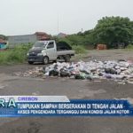 Tumpukan Sampah Berserakan di Tengah Jalan